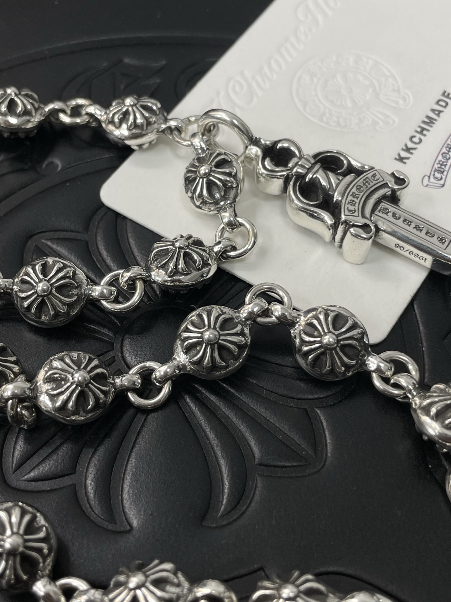 Customer order: Cross-shaped floral ball, sword binding chain