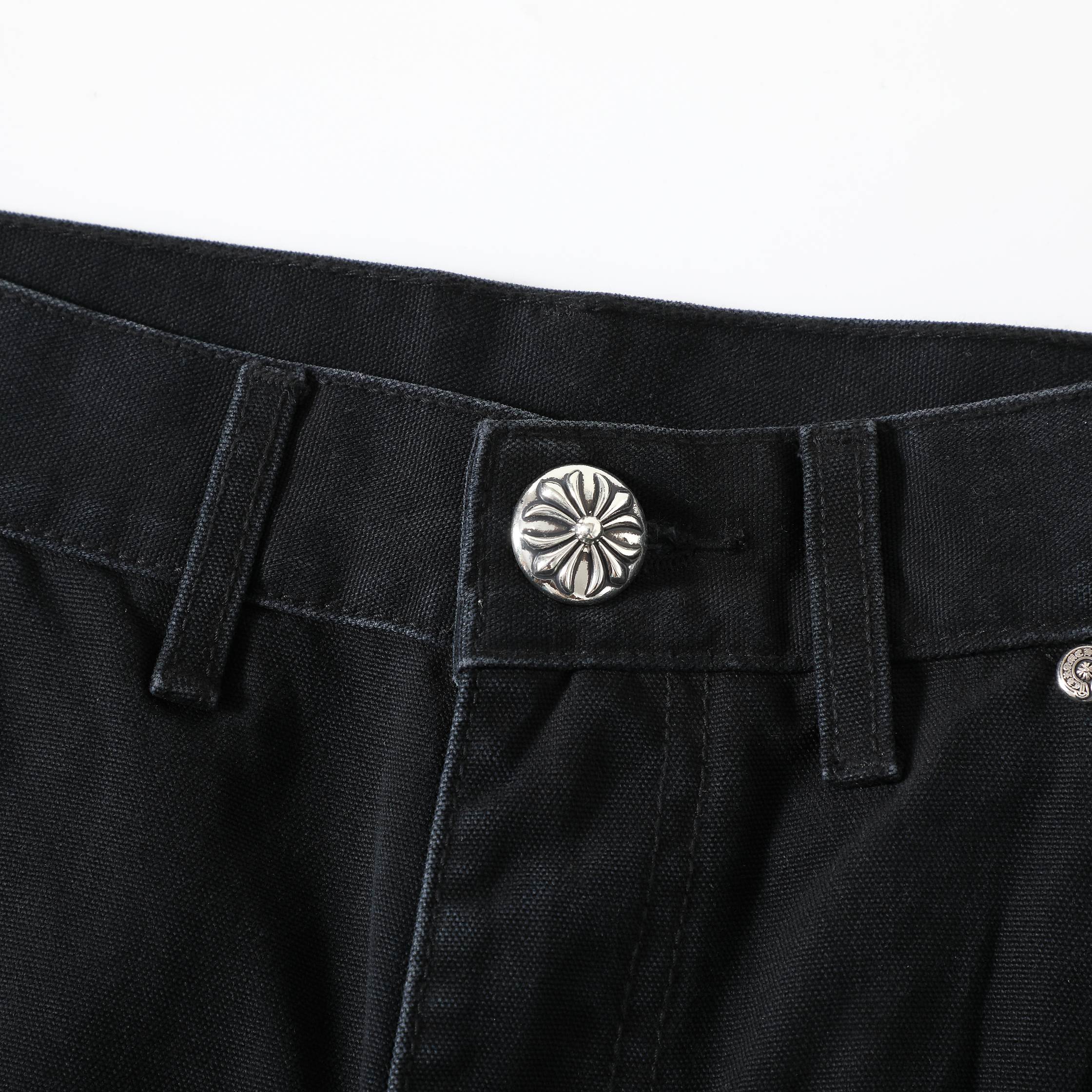 CH Distressed Carhart Style Work Pants with Green Leather PatchesThe fabric is a high-density, high-count, high-resin reactive black cotton Juvan.The fabric's high thread count and density give it a three-dimensional look.It's thick yet soft an