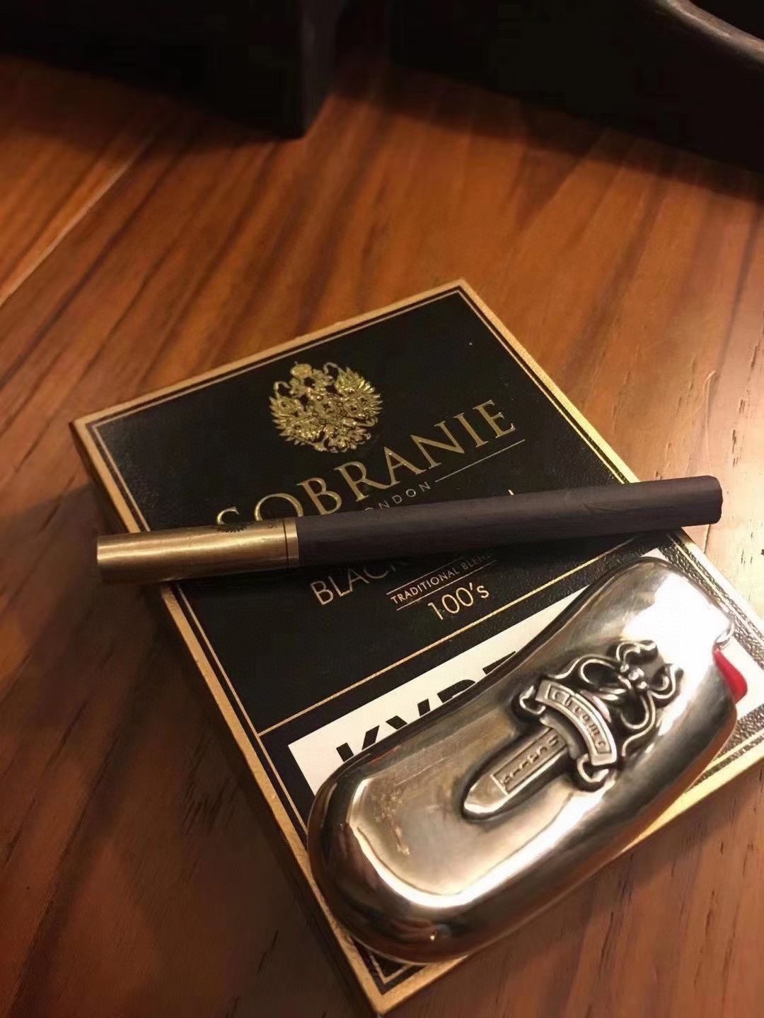 Chrome Hearts Cross Lighter - Detailed Photos. Made entirely of 925 sterling silver with an antique finish and perfect oxidation. The curved shape feels exceptionally good in the hand. A high-end toy.