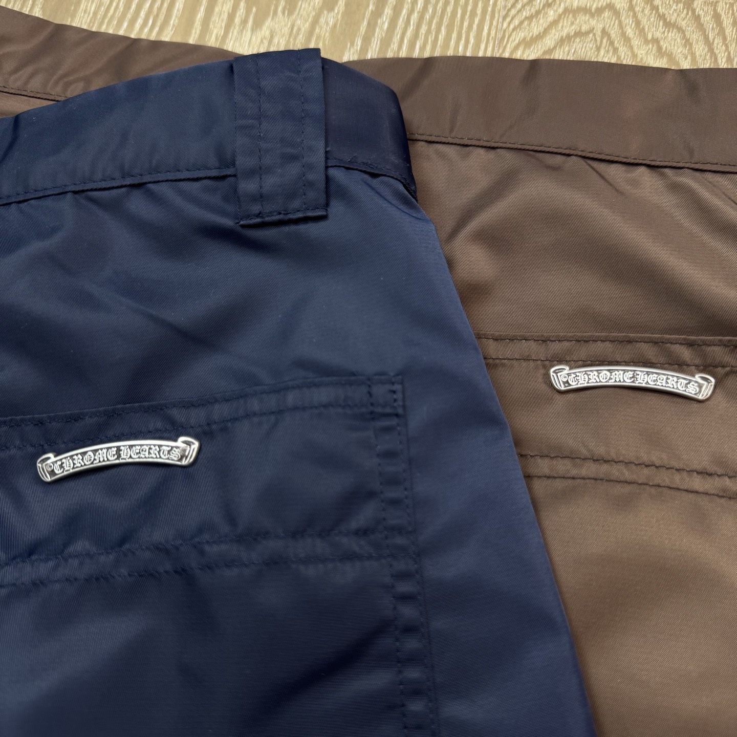 Chrome Hearts New Pants with Leather Patched and Logging FeaturesMatched design and color; silver-plated hardwareYellow leather cross on the backBoth knees are made from a single piece of leatherSizes 28, 30, 32, 34