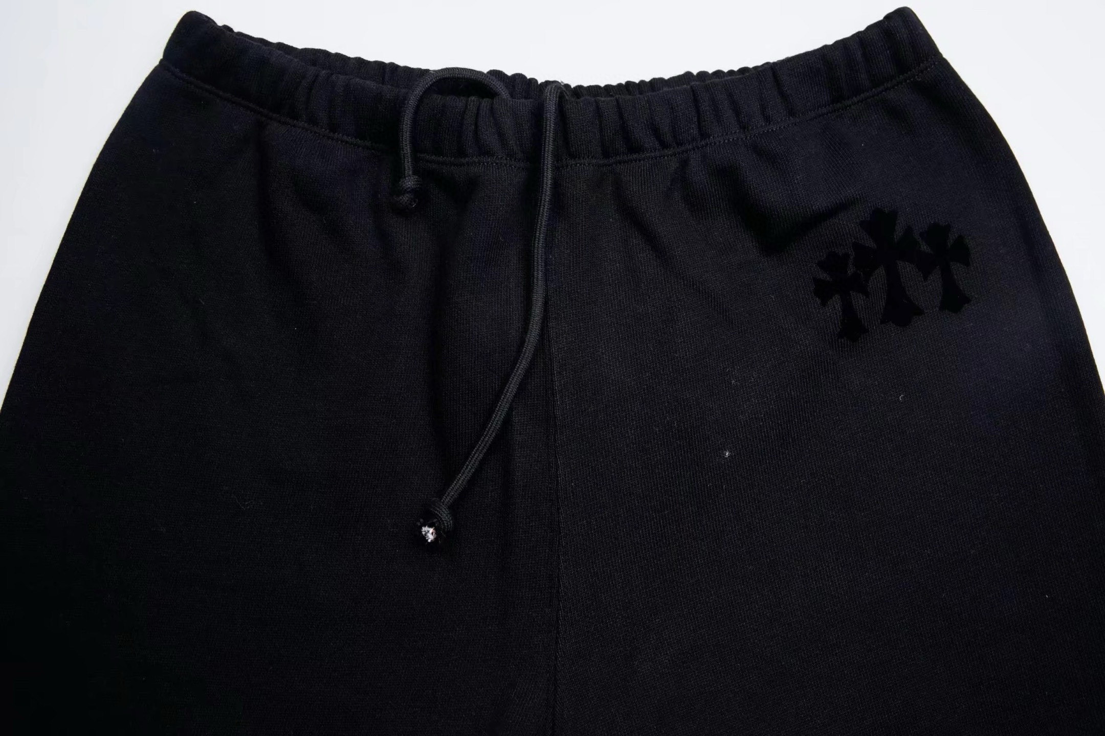 Chrome Hearts Grey Flocked Three Cross Casual Sweatpants. Custom-woven and dyed chunky knit loose fabric, segmented cut. Uses the same electrostatic flocking process as the finished garment, not the usual die-cut process; the color may vary depending