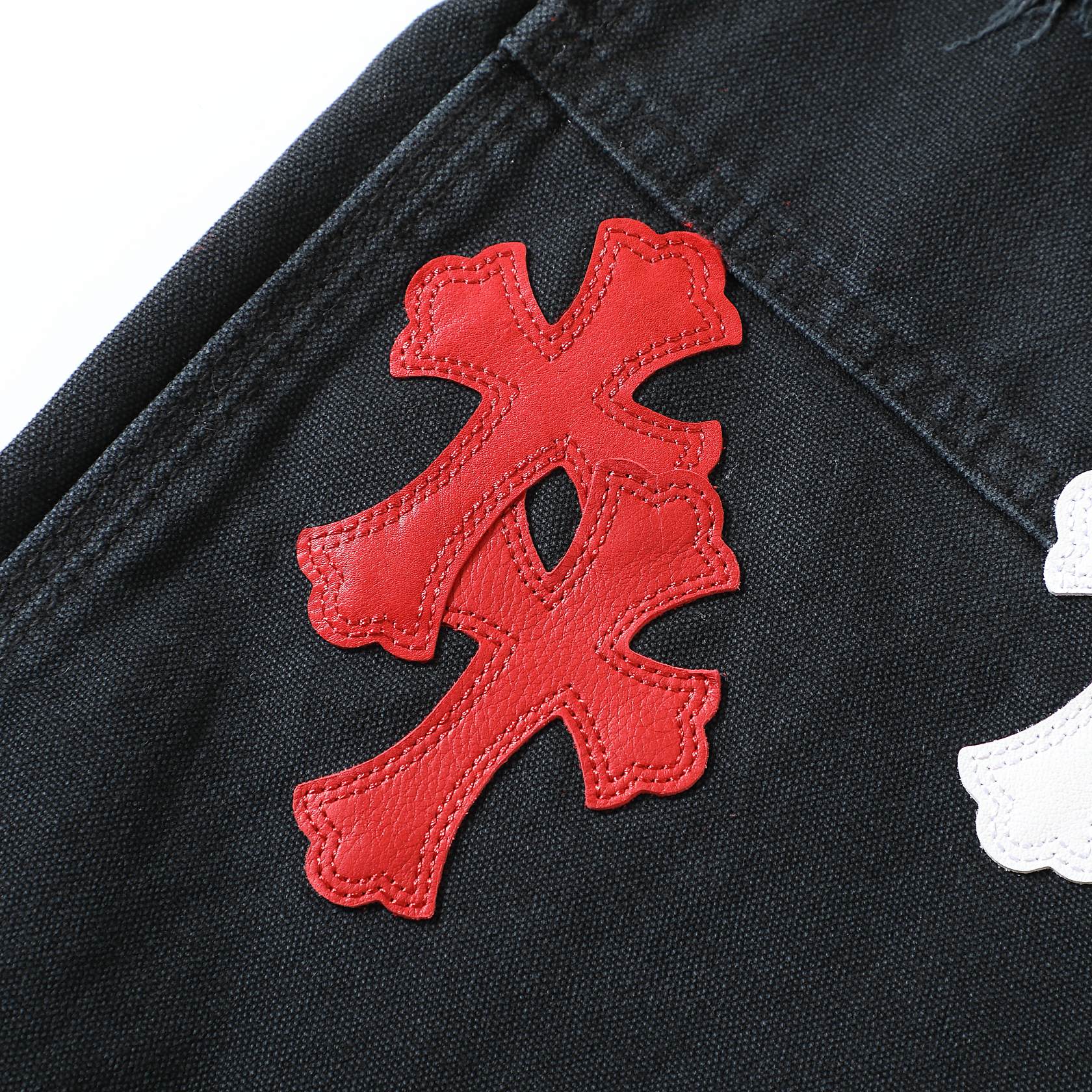 CH Genuine Leather Embroidered Chrome Hearts Jeans, made with custom-made 390g high-denim fabric, featuring custom-made silver-plated Chrome Hearts buttons. The crosses are hand-embroidered from top-grain sheepskin (27 genuine leather crosses in tota