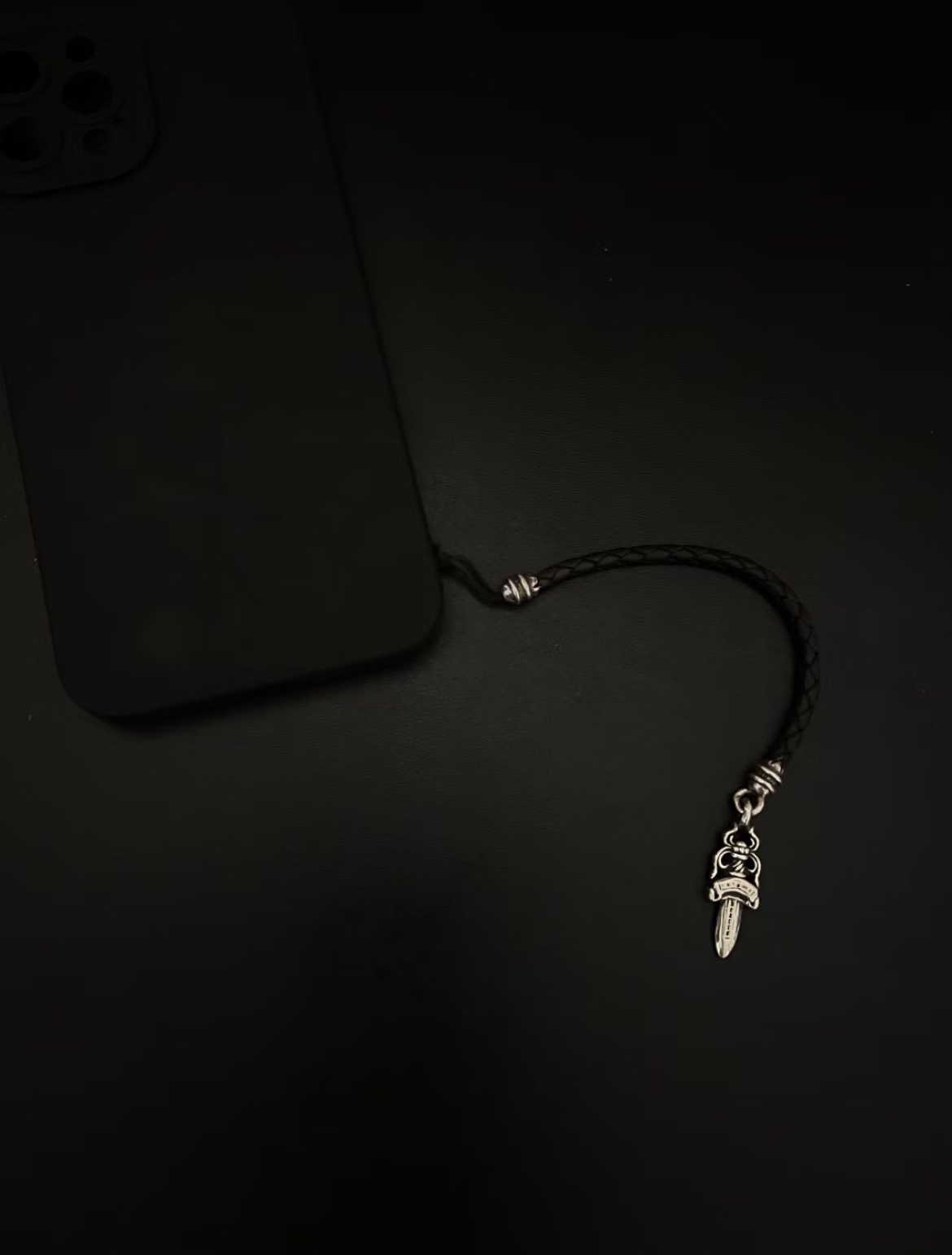 Chrome Hearts Sword Pendant Phone Charm. Purchased at the counter for ¥5900 RMB. Sold out instantly during a limited-time flash sale on the official website. Top-of-the-line phone strap, perfect for iPhones. Hand-woven from imported cowhide. I search