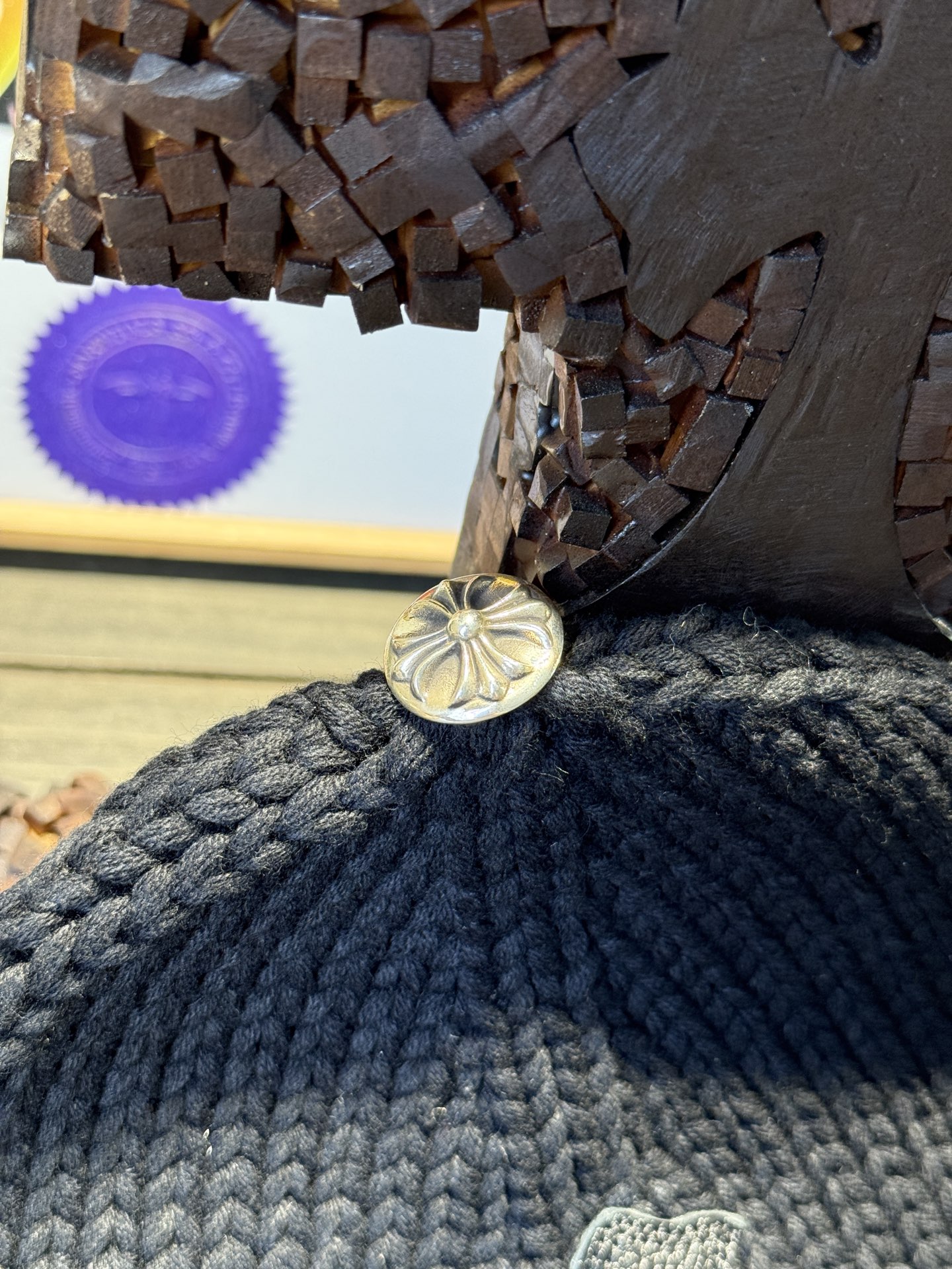 Custom-ordered cross-patterned leather beanie with sterling silver buckle and premium car emblem.