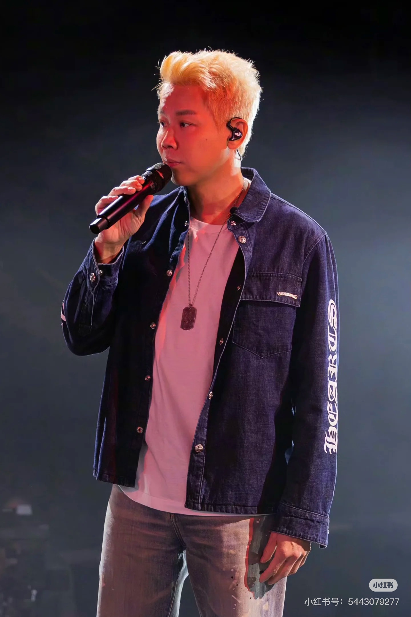 Chrome Hearts logo on the arm with Sanskrit lettering; large silver scroll and cross design on the chest; blue denim jacket. Sizes: S, M, L.