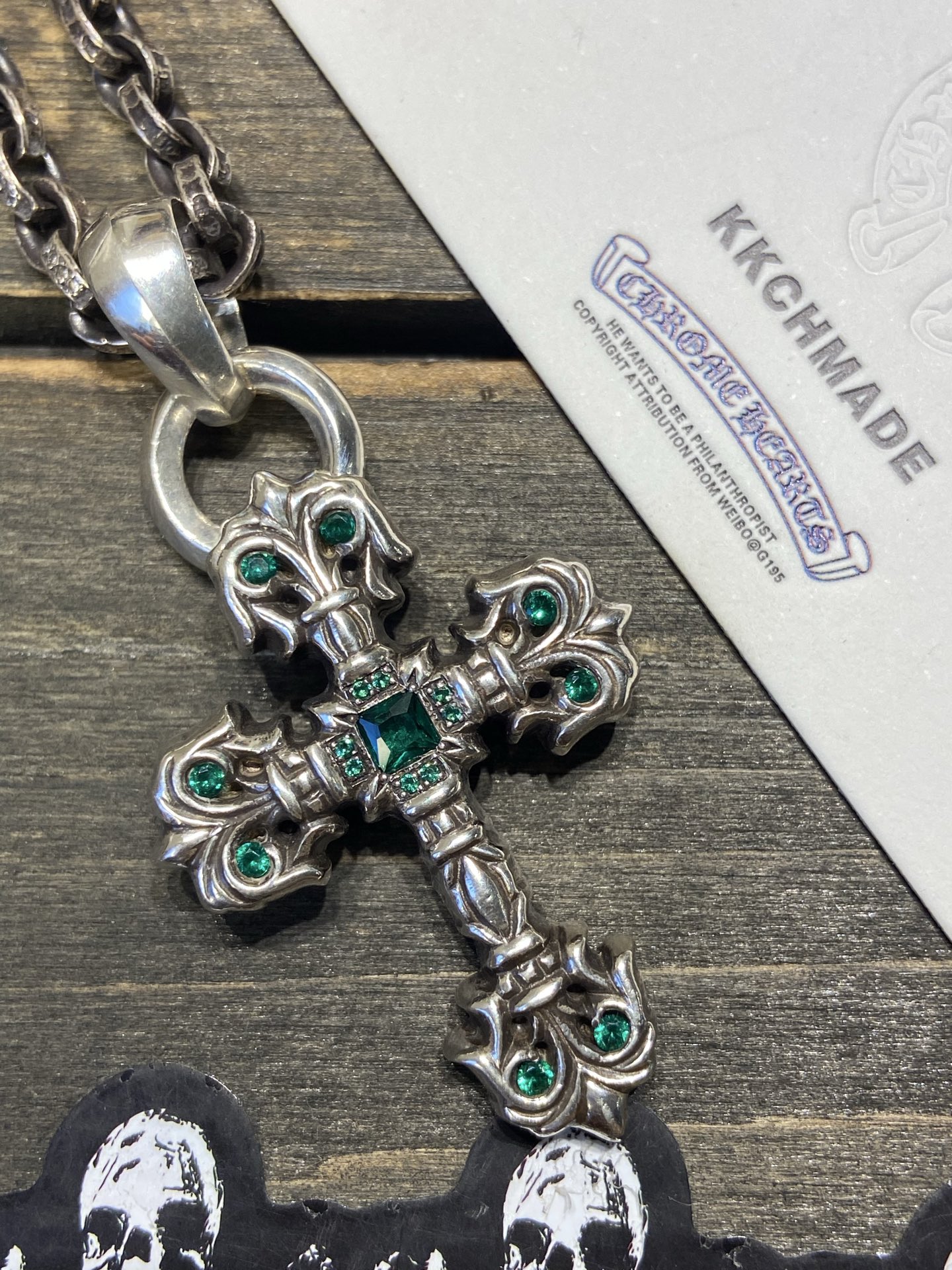 Customer order: Medium-sized flame cross necklace with green diamond setting + PP letter chain