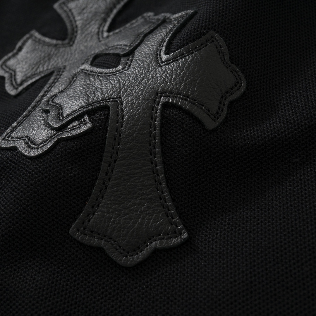 CH Chrome Hearts Exclusive Polo Shirt in Patchwork LeatherThe fabric is made of pique satin, incredibly smooth and comfortable against the skin with a cool feel. It features three top-grain cowhide cross panels on the front and back, and the neck la