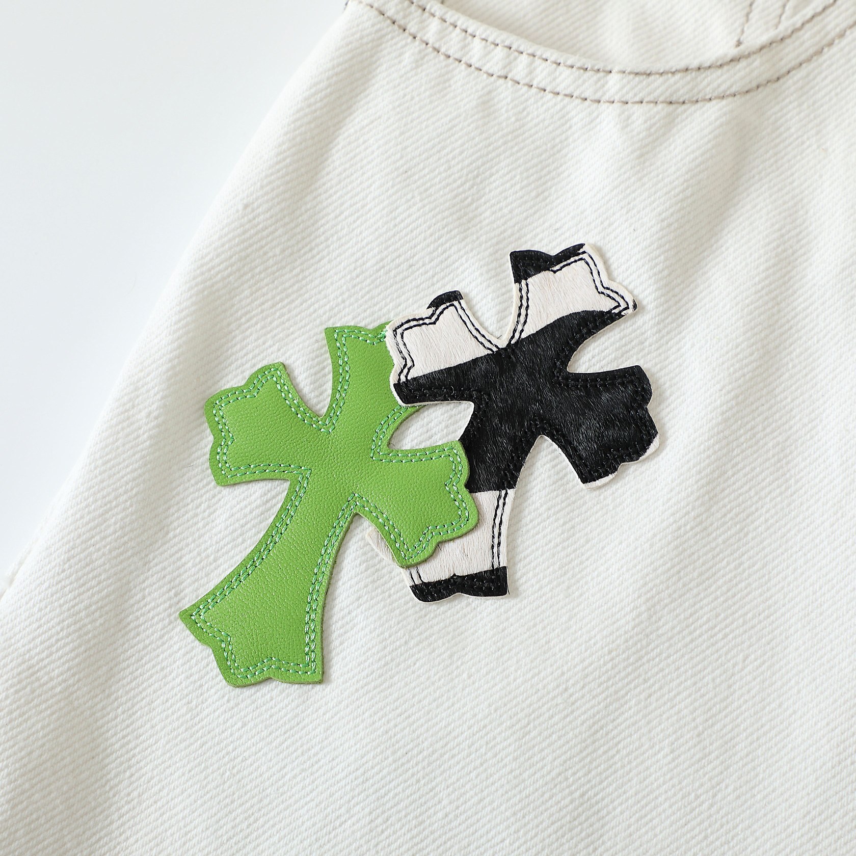 Horsehair Apple Green Cross JeansWe've released men's and women's versions of these jeans, as they look great on women too!The cross is made from genuine horsehair.Exclusive, authentic version available. Feel free to compare from any angle!Th