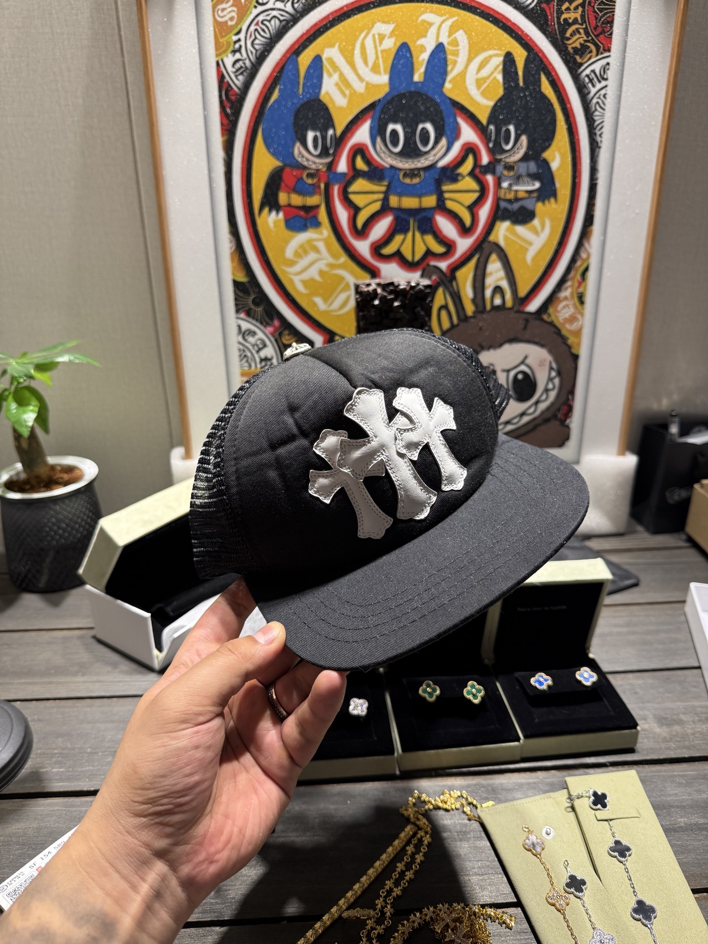 Custom-ordered 30-cross baseball cap with sterling silver buckle and premium car emblem.