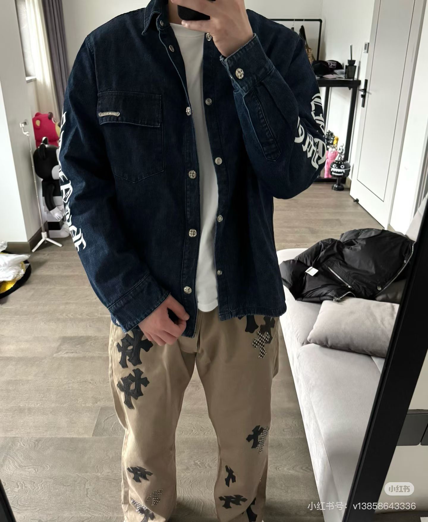 Chrome Hearts logo on the arm with Sanskrit lettering; large silver scroll and cross design on the chest; blue denim jacket. Sizes: S, M, L.