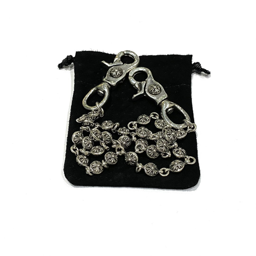 Chrome HeartsCross Flower Ball Bag Chain - Vintage QualityAuthentic Pattern - Authentic Antique Engraving & Oxidation TextureSteel Mold Pattern - Total Length (including lobster clasp): 65cm - Weight: 160g - Entirely 925 Sterling Silver - Material