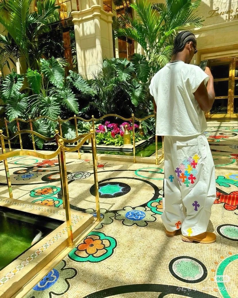 Chrome Hearts Heavyweight Paratrooper Pants with Colorful Crosses. A relaxed, laid-back fit, suitable for waist sizes 66-100cm. The fabric is custom-woven and dyed, requiring a carbon-brushed finish on the front followed by a brushed finish (resultin