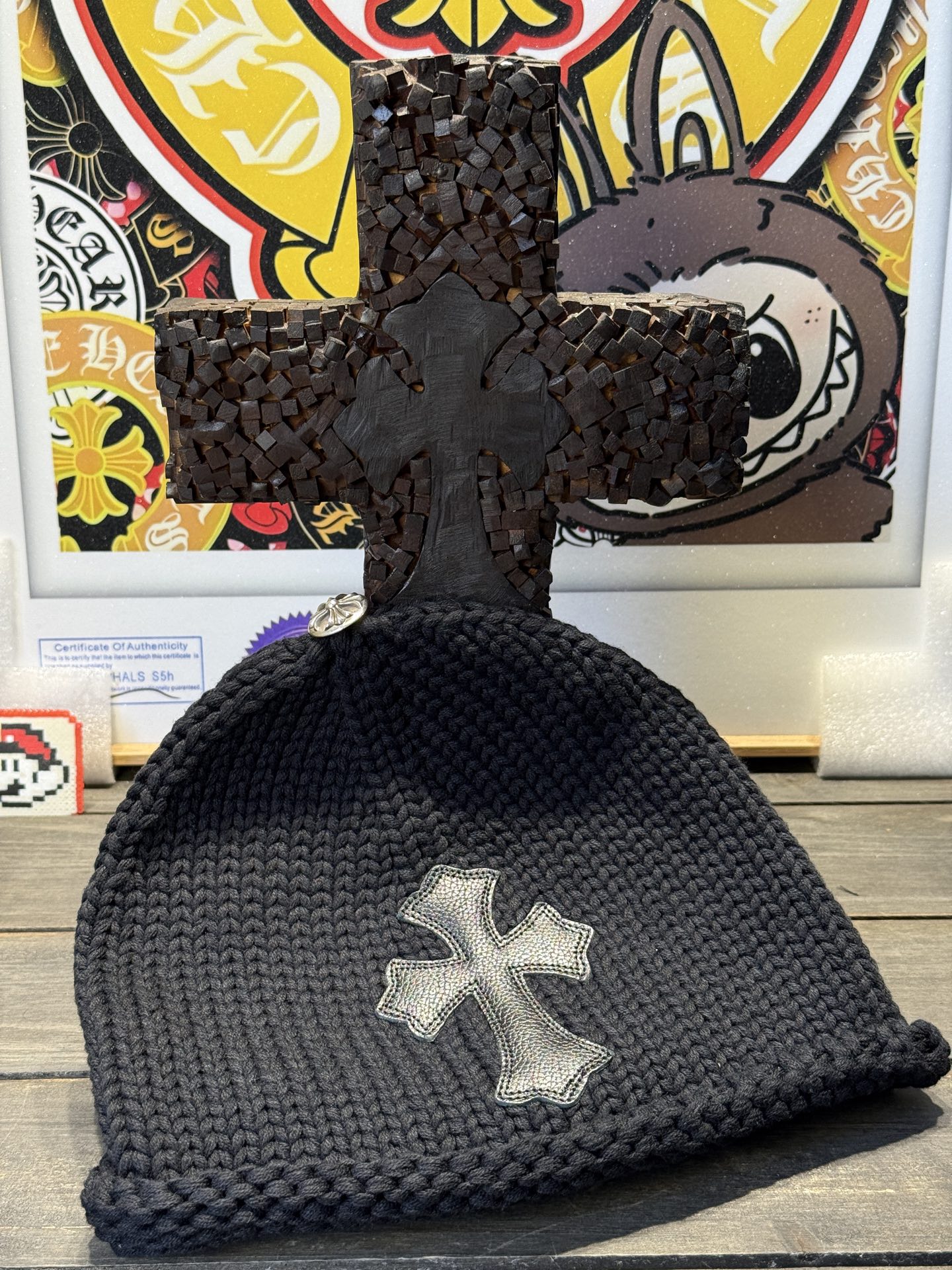 Custom-ordered cross-patterned leather beanie with sterling silver buckle and premium car emblem.