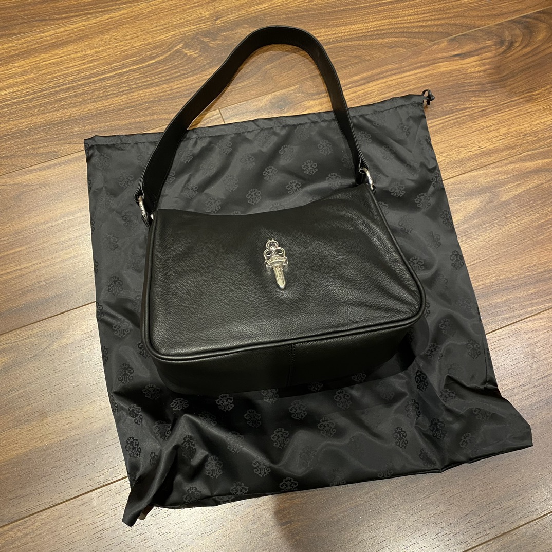 Chrome Hearts Large Chicken Nuggets Bag925 Sterling Silver Hardware, Solid Black Large Chicken Nuggets Bag. Extremely difficult to find in boutiques. Silver hardware was made from authentic Chrome Hearts leather. The design is completely identical.