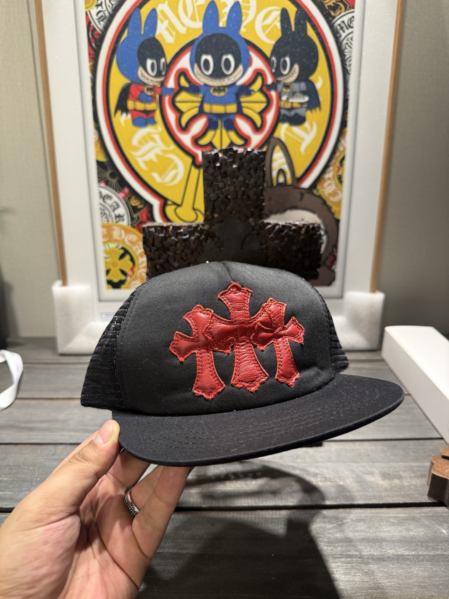 Custom-ordered 30-cross baseball cap with sterling silver buckle and premium car emblem.