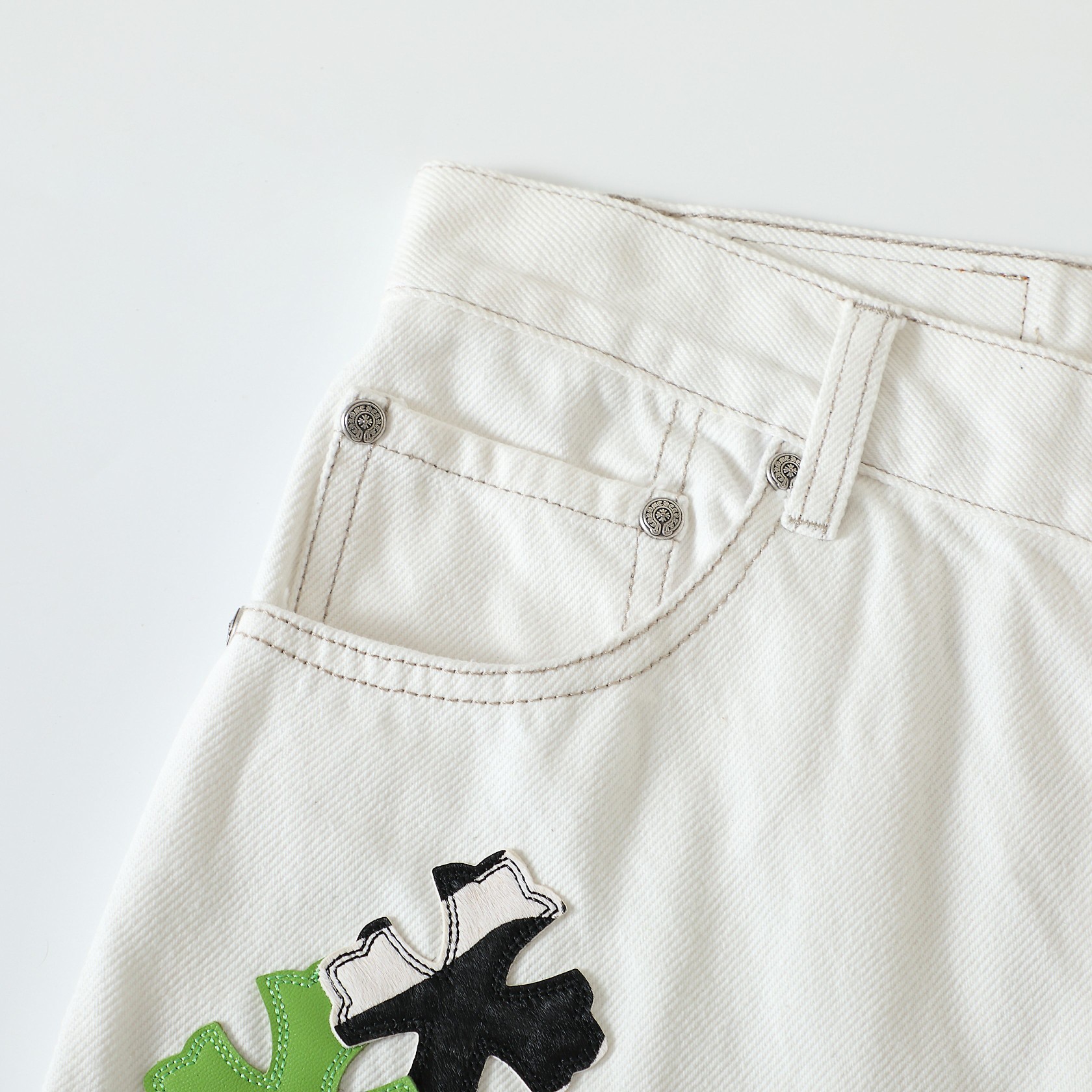 Horsehair Apple Green Cross JeansWe've released men's and women's versions of these jeans, as they look great on women too!The cross is made from genuine horsehair.Exclusive, authentic version available. Feel free to compare from any angle!Th