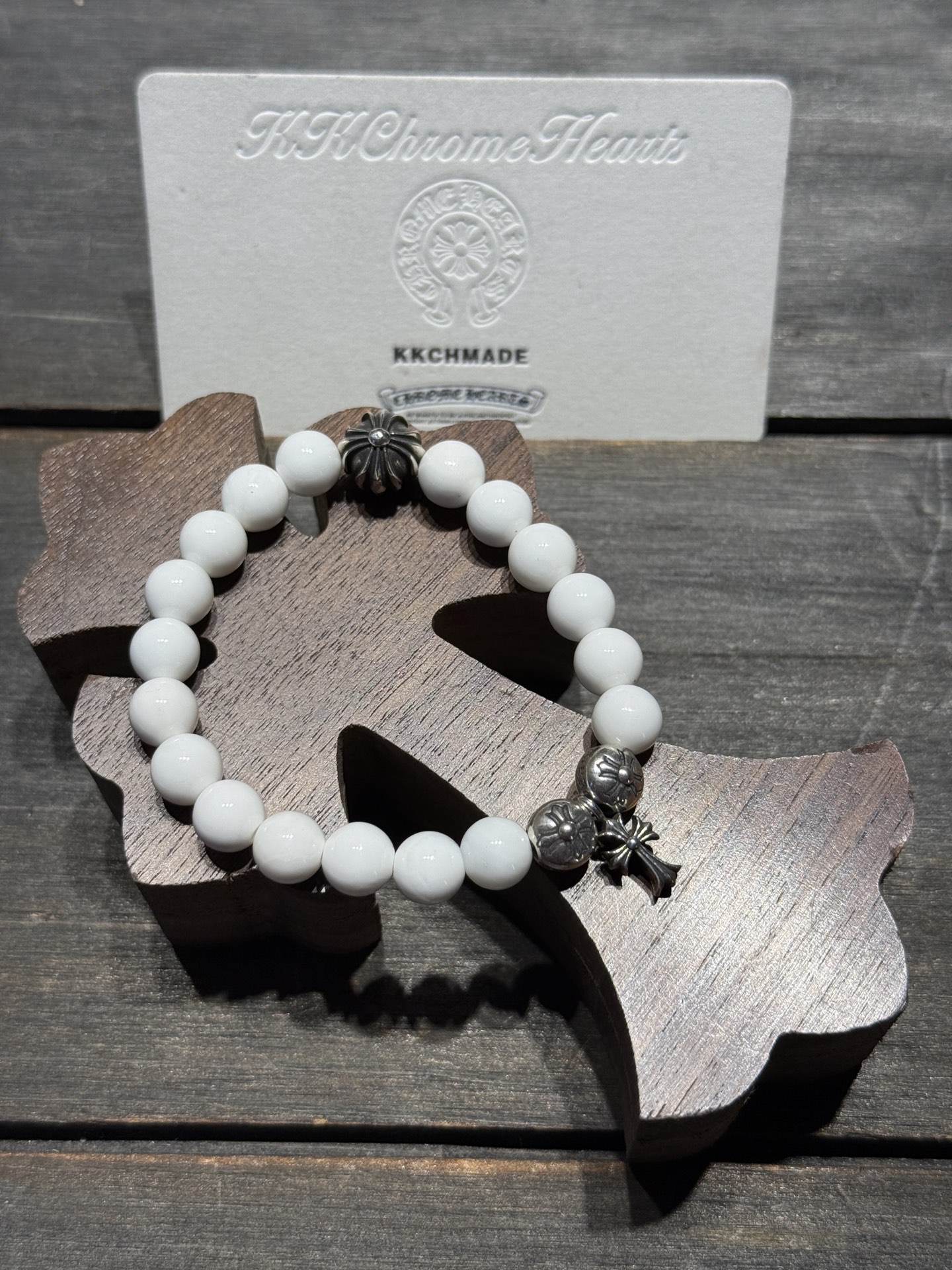White agate cross silver bead bracelet available now.