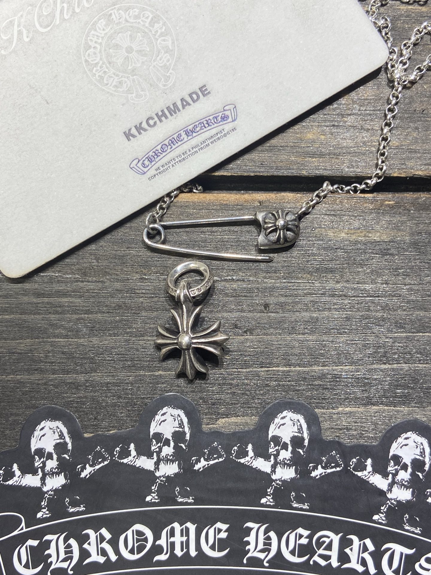 Small cross flower pendant, in stock.