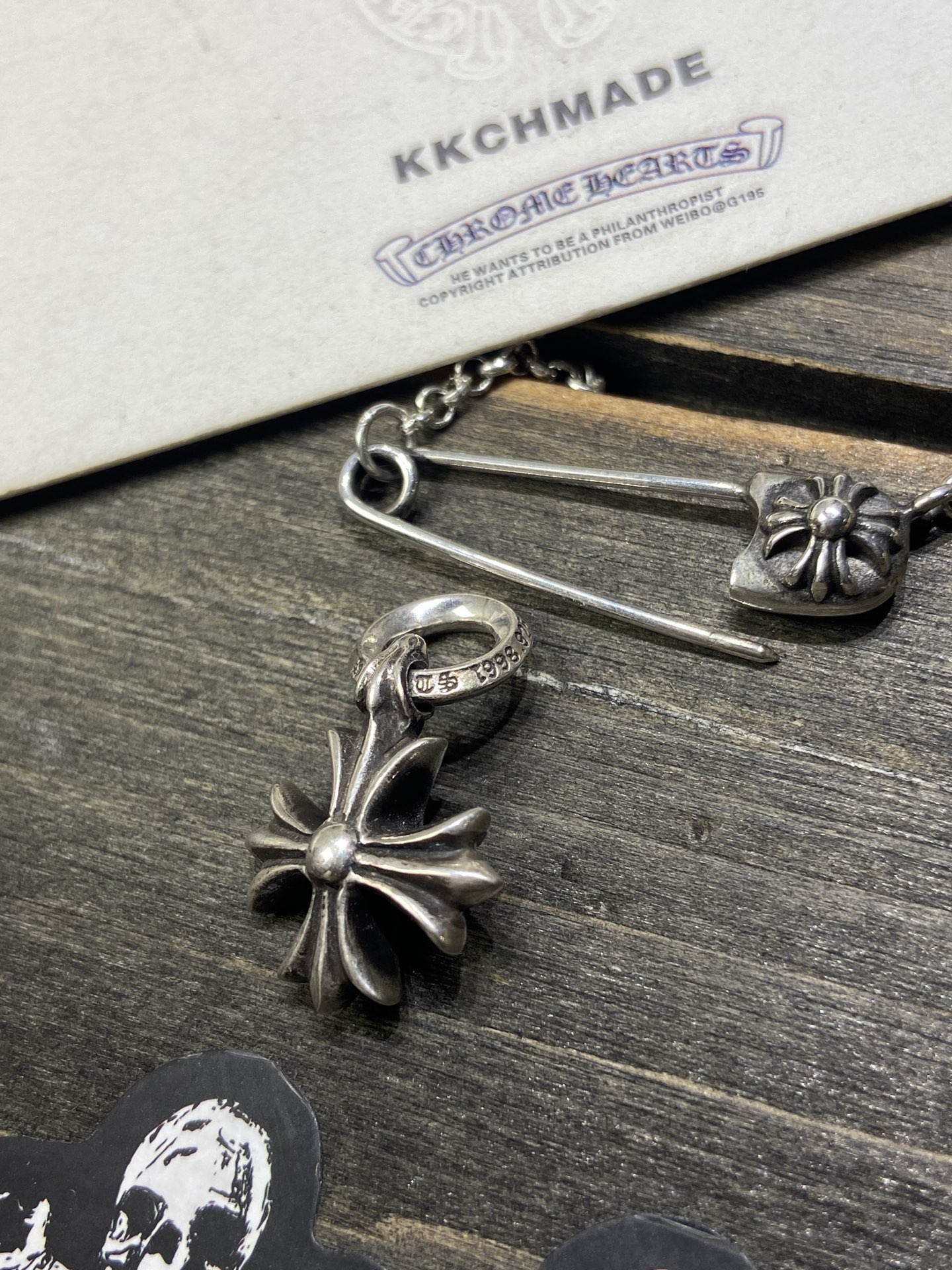 Small cross flower pendant, in stock.
