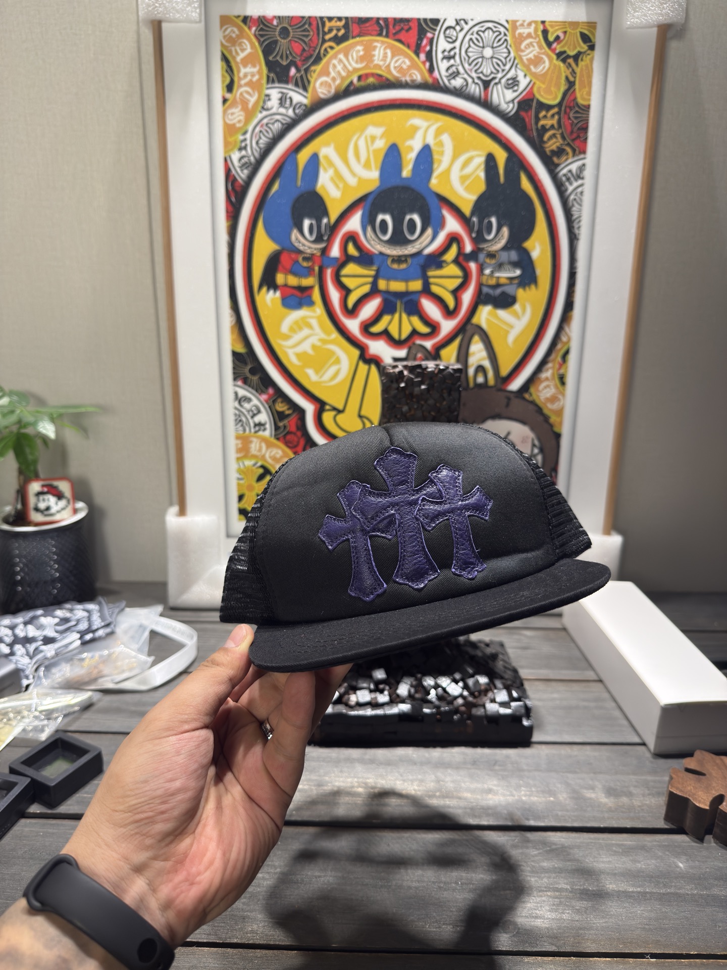 Custom-ordered 30-cross baseball cap with sterling silver buckle and premium car emblem.