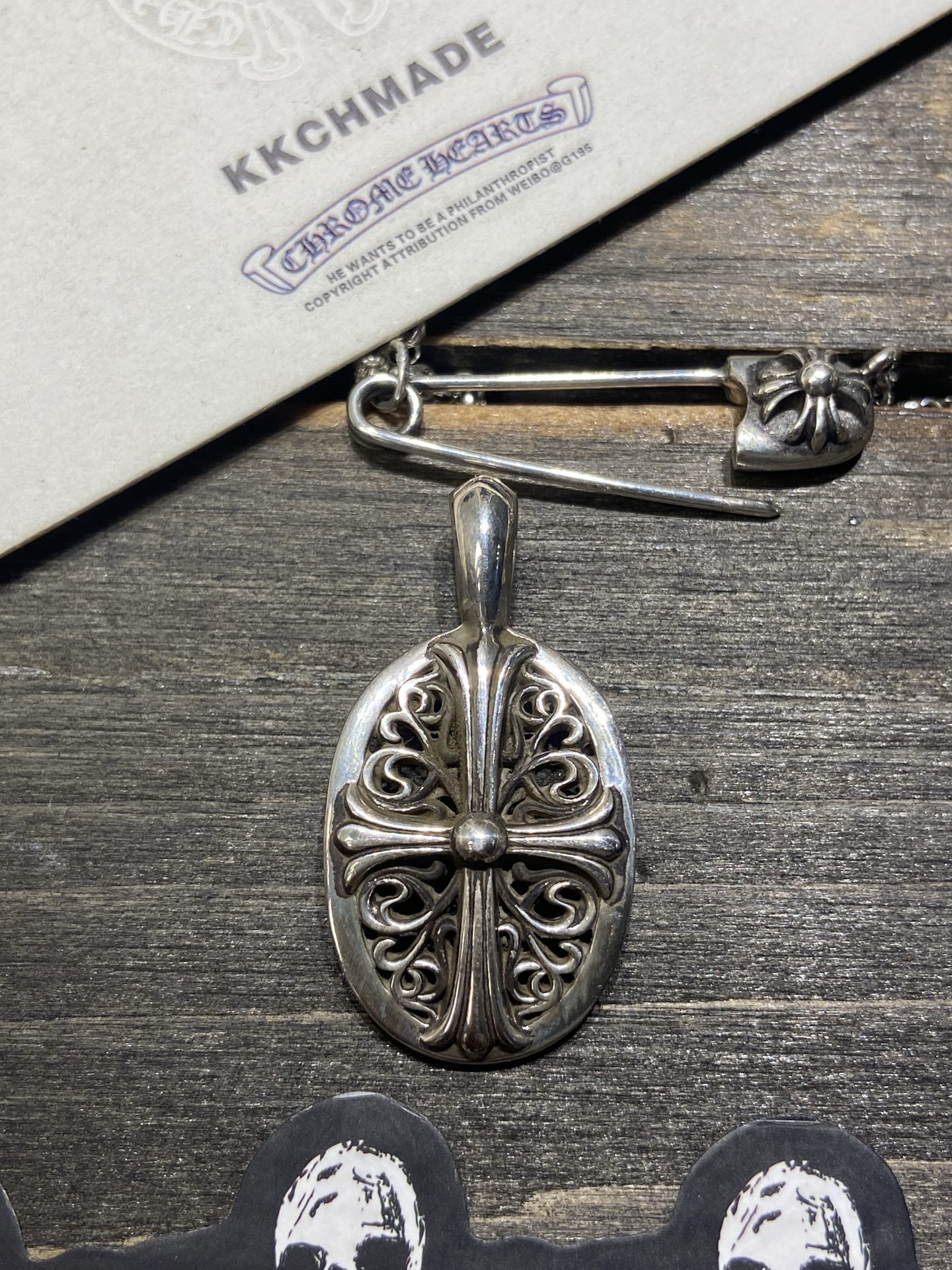 Cross vine pendant, available now.