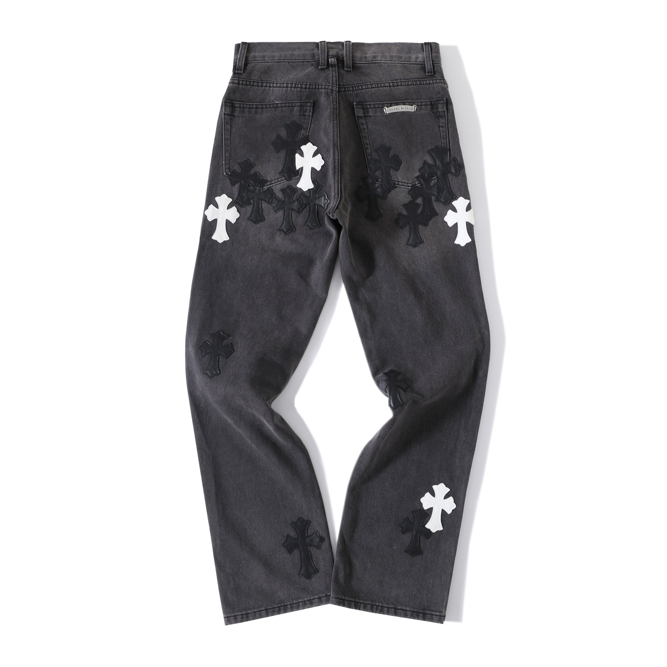 CH Flame Knee Design, Black and White Leather. Custom-made fabric, original jacquard lining, embroidery. Knee flame design perfectly replicated. Made with dozens of genuine leather crosses. Extremely high cost, significant wastage, and high labor cos
