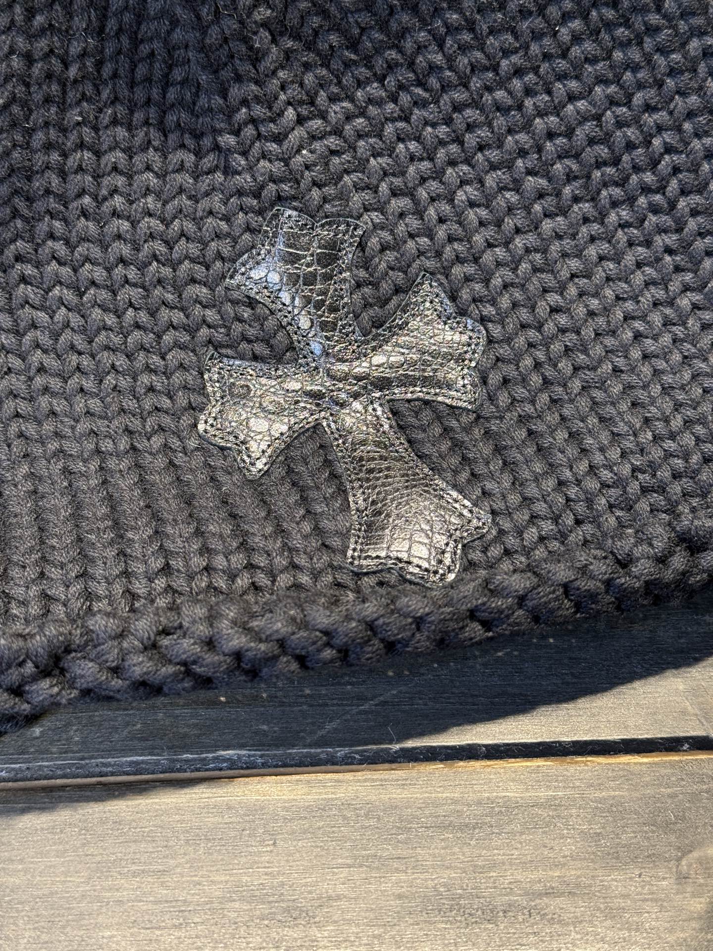 Custom-ordered crocodile leather cross beanie with sterling silver buckle and top-grade car emblem.