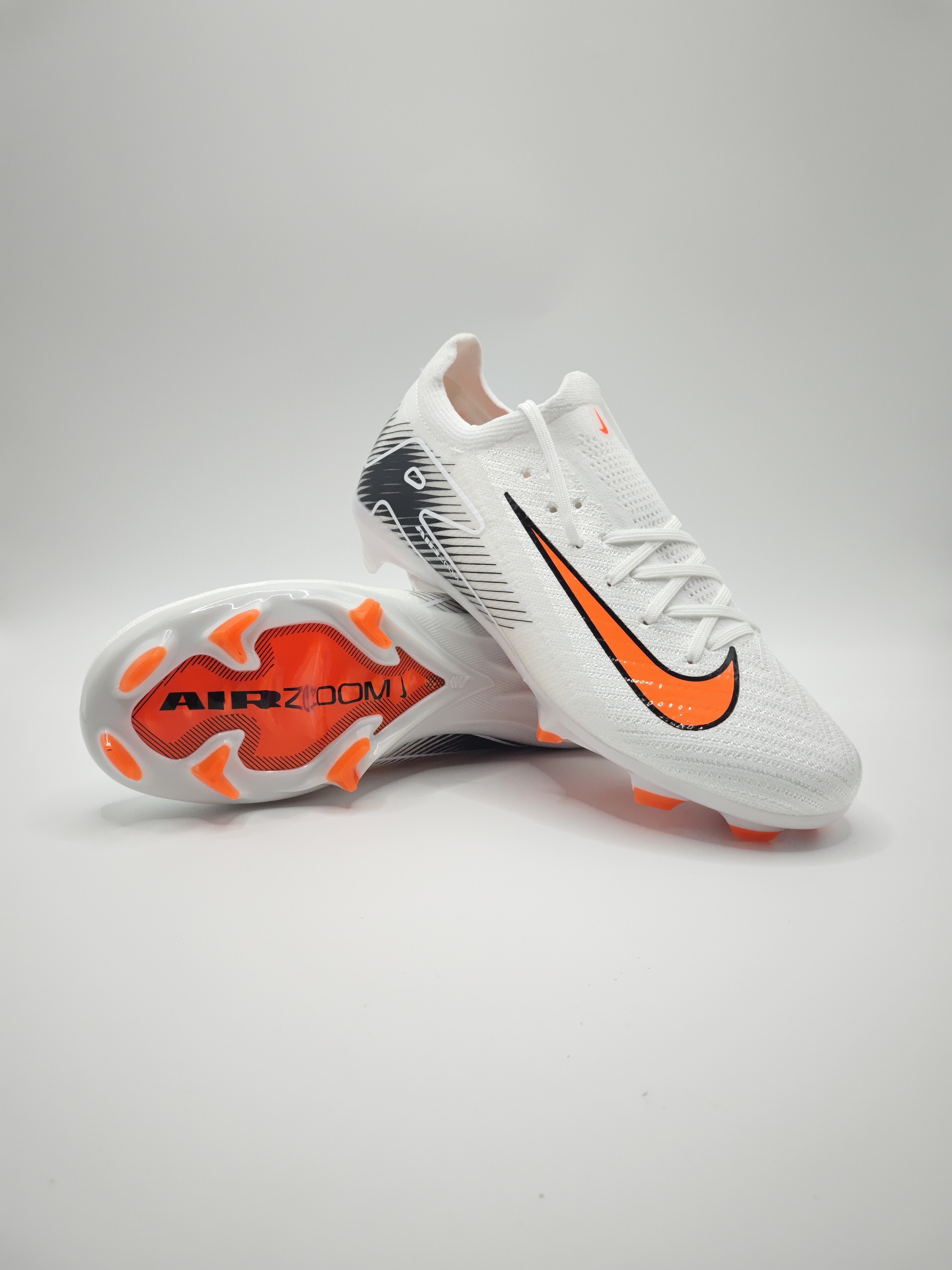 Nike Mercurial 16 FG Soccer Cleats with Built-in Bonded Pack: Full Air Cushion for All-Game Comfort, Waterproof Knit for Rainy Fields