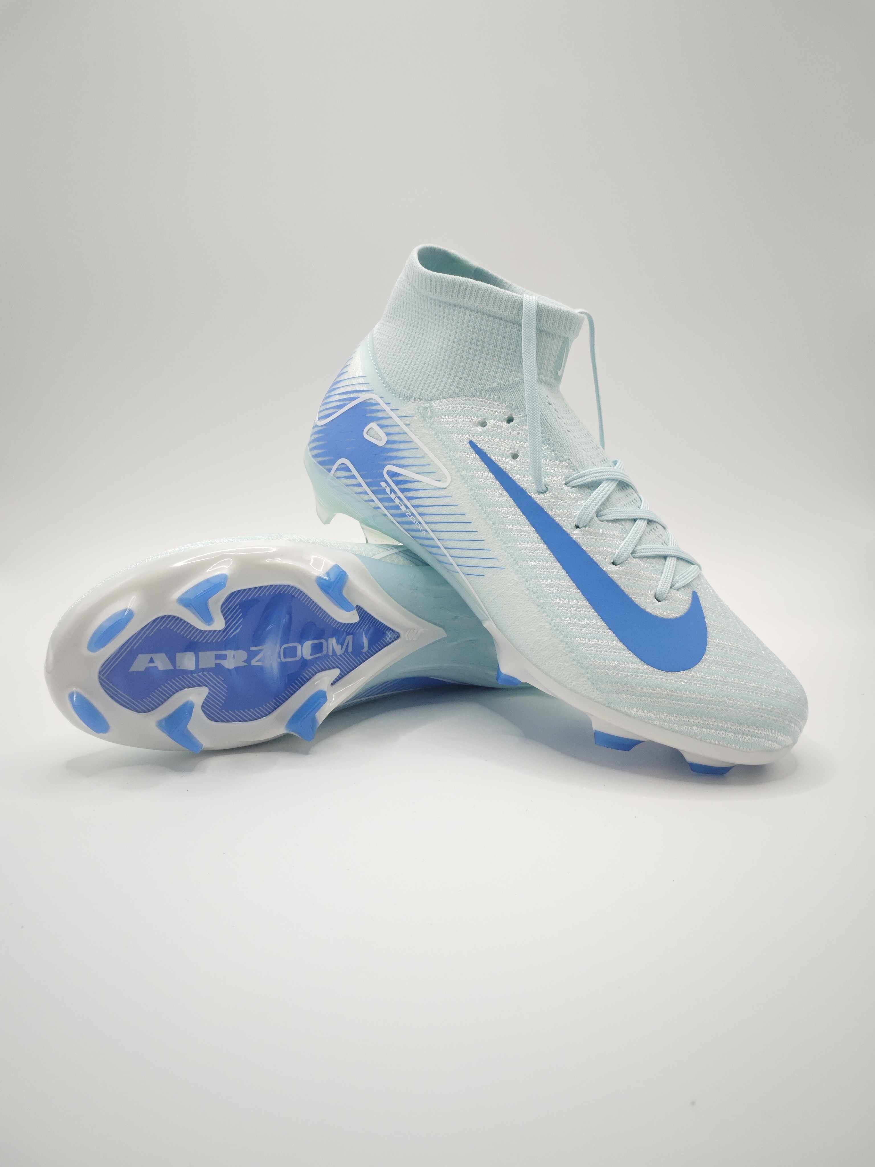 Nike Mercurial 16 FG Soccer Cleats with Built-in Bonded Pack: Full Air Cushion for All-Game Comfort, Waterproof Knit for Rainy Pitches