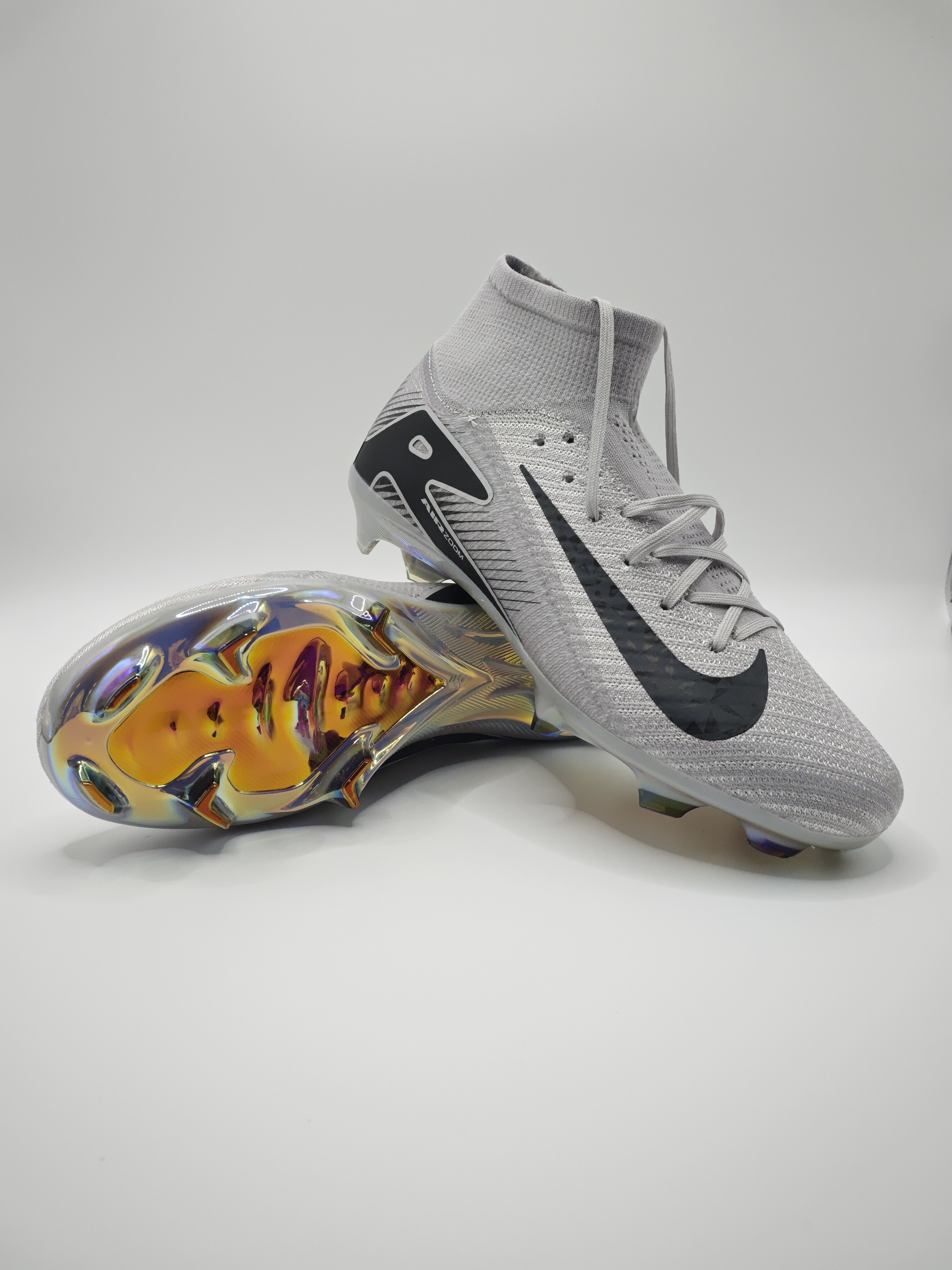 Nike Mercurial 16 FG Soccer Cleats with Built-in Bonded Pack: Full Air Cushion for All-Game Comfort, Waterproof Knit for Rainy Pitches