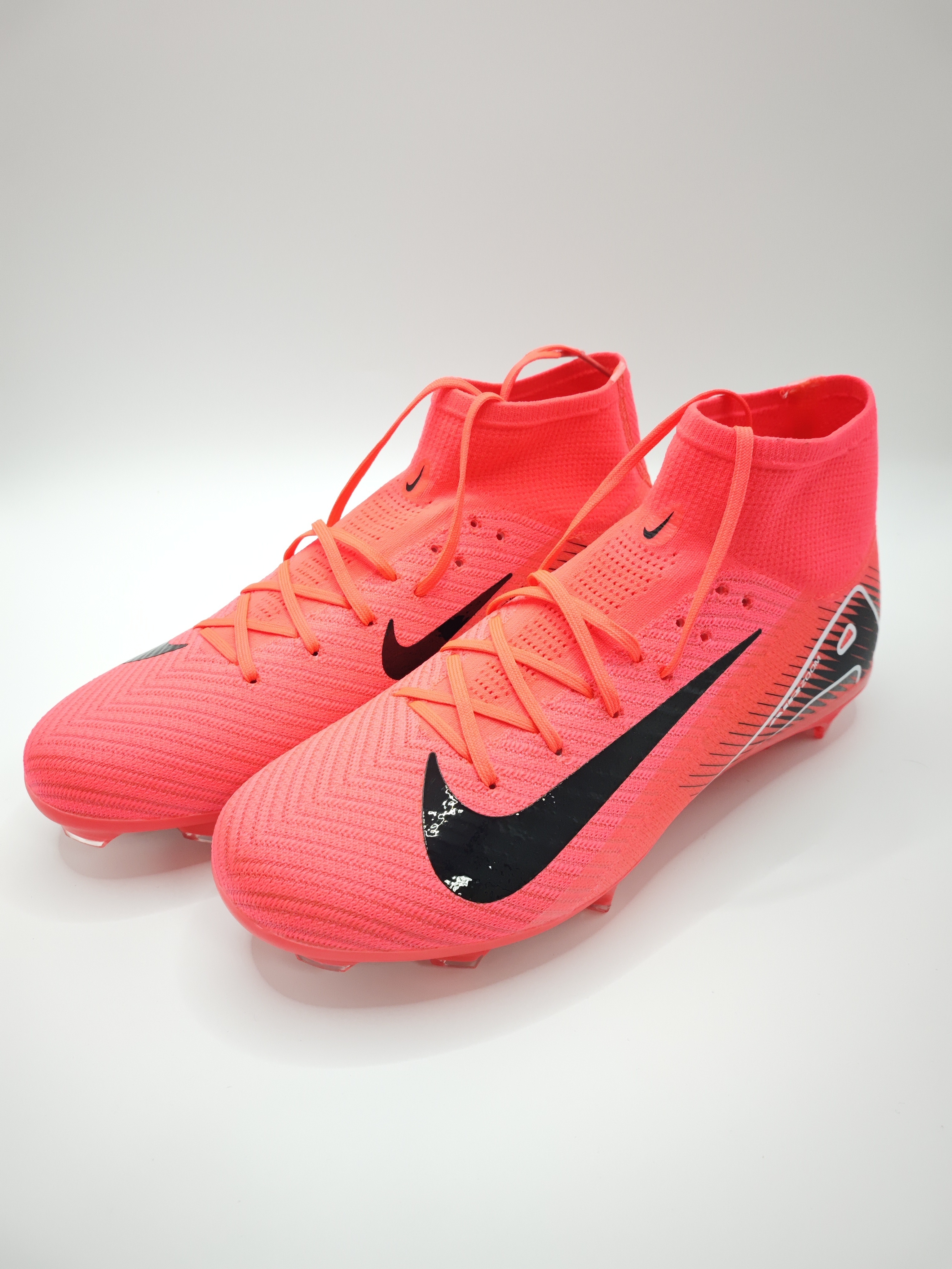 Nike Mercurial 16 FG Soccer Cleats with Built-in Bonded Pack: Full Air Cushion for All-Game Comfort, Waterproof Knit for Rainy Fields