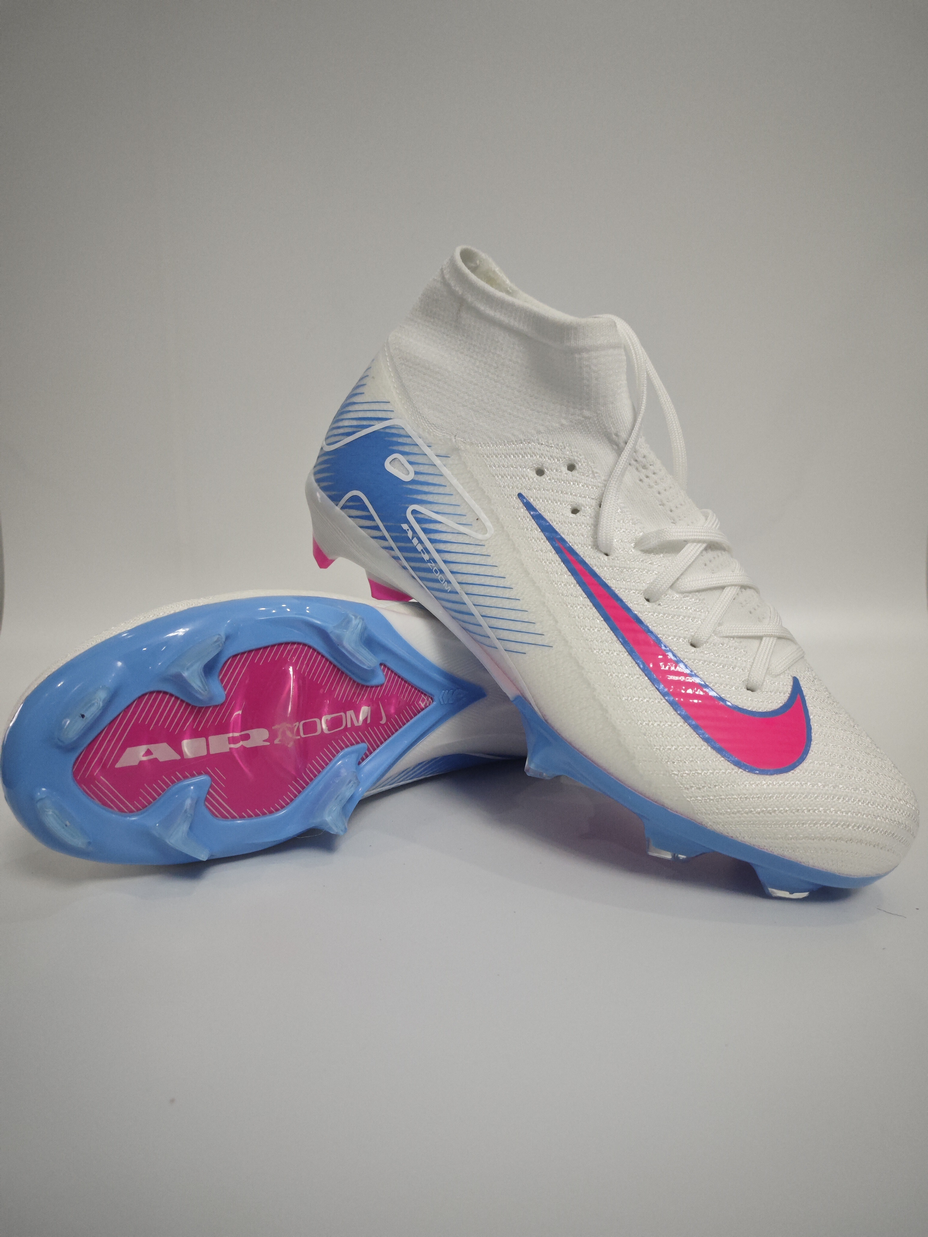 Nike Mercurial 16 FG Soccer Cleats with Built-in Bonded Pack: Full Air Cushion for All-Game Comfort, Waterproof Knit for Rainy Pitches